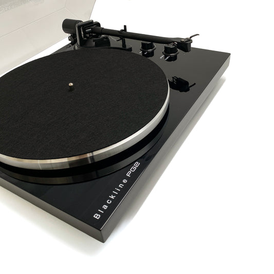 Three-quarter studio view of the Blue Aura Blackline PG2 premium Hi-Fi turntable, showcasing its elegant high-gloss black plinth, built-in phono preamp and wireless Bluetooth connectivity.