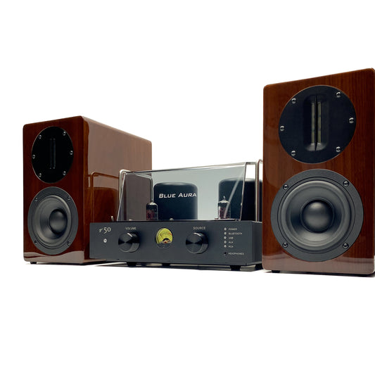 Official three-quarter studio view of the premium Blue Aura v50 and AT700 Walnut high-fidelity stereo system pack, showcasing the design from an angled perspective.