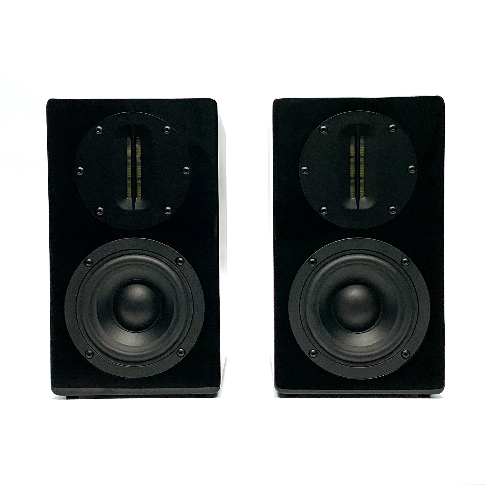Official straight front studio view of a pair of Blue Aura AT700 compact bookshelf speakers in high-gloss piano black finish without their grilles.