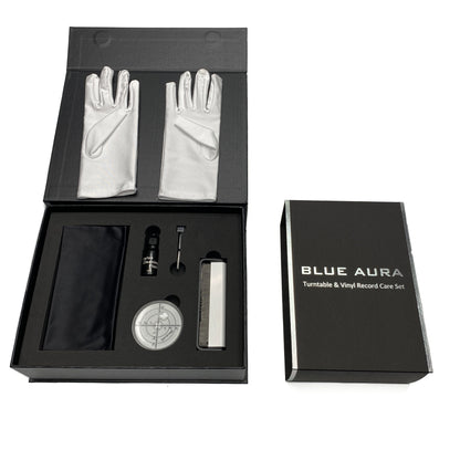 Inside look of the opened Blue Aura official accessories box showing the neatly arranged premium handling gloves and turntable & vinyl care tools.