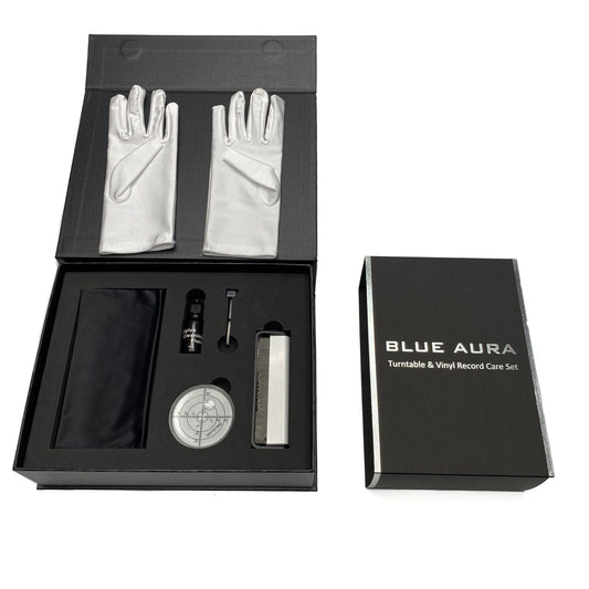 Inside look of the opened Blue Aura official accessories box showing the neatly arranged premium handling gloves and turntable & vinyl care tools.