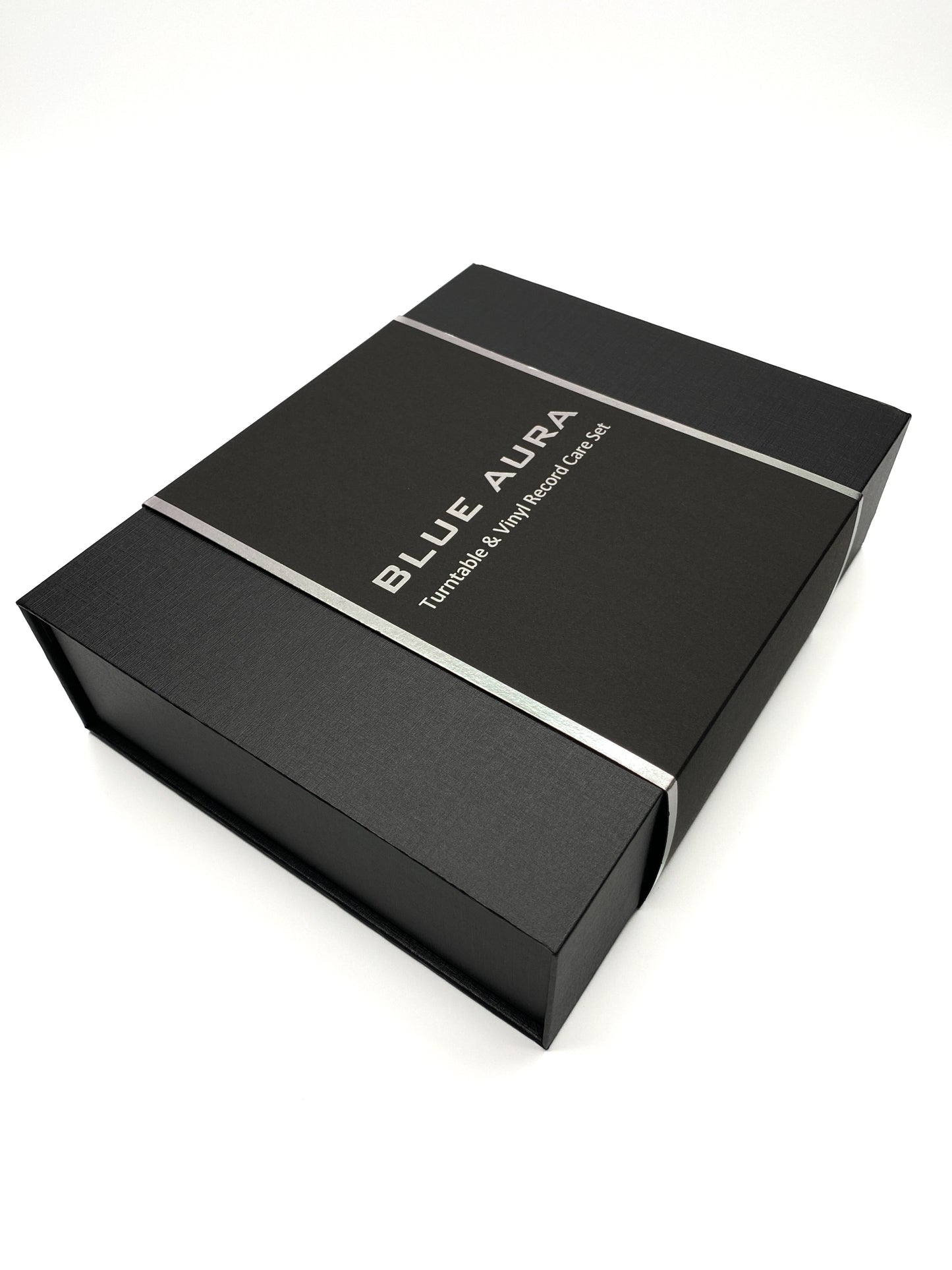 Three-quarter studio view of the premium Blue Aura Turntable & Vinyl Record Care Set box on a white background.