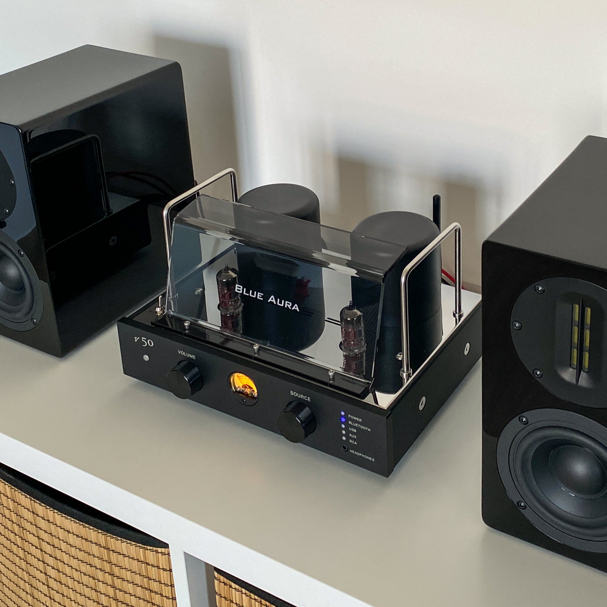 Close-up of the front panel and valves of the Blue Aura v50 amplifier.