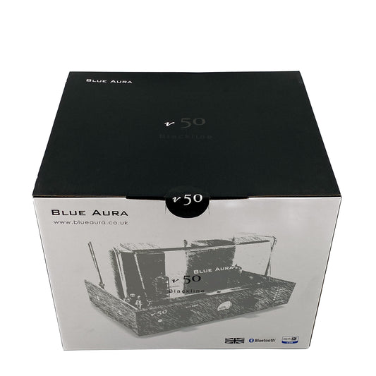 High-angle three-quarter studio shot of the official branded retail packaging box for the Blue Aura v50 hybrid valve amplifier.