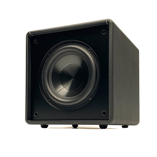 Official three-quarter studio shot of the Blue Aura X-Sub active subwoofer without its front grille, showcasing the front-firing driver and premium black leatherette cabinet.